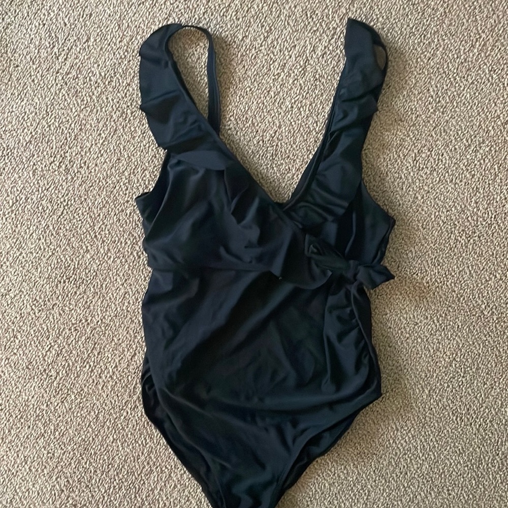 Kindred Bravely Ruffled Black swimsuit.